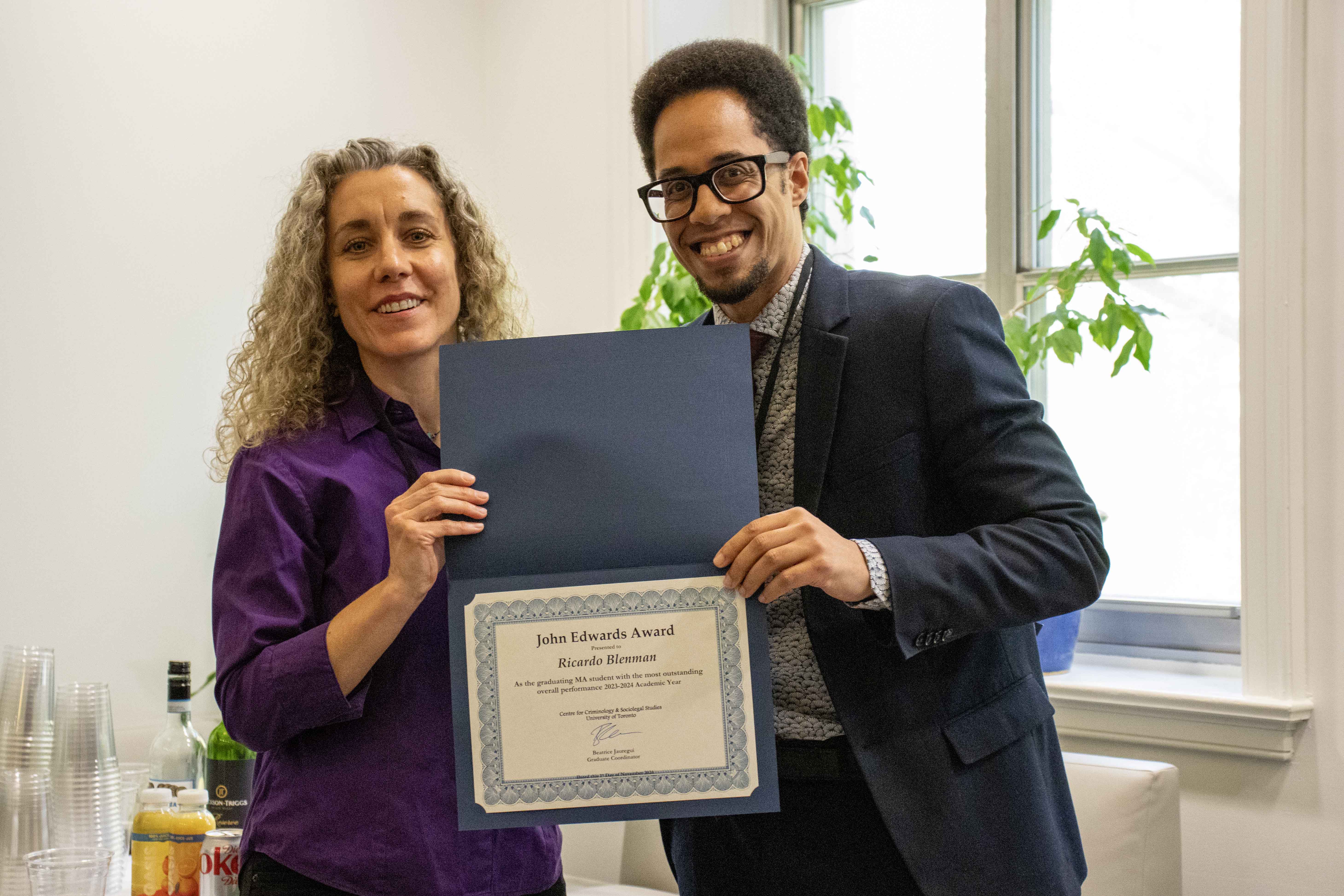 2024 11 01 Beatrice Jauregui, Ricardo Blenman with award certificate