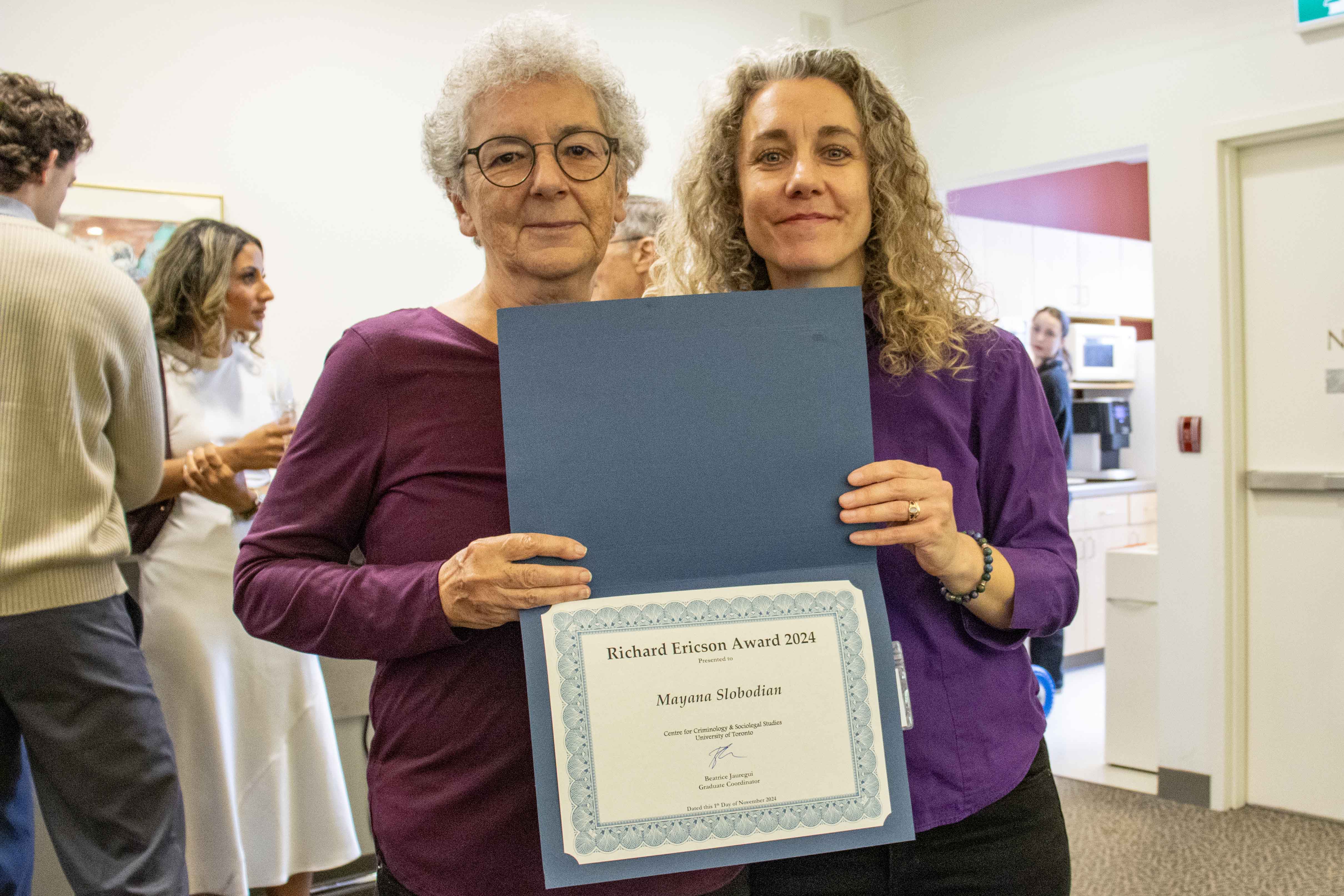 2024 11 01 Mariana Valverde, Beatrice Jauregui hold certificate for Mayana Slobodian